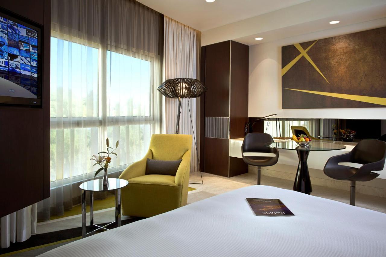 Al Ain Rotana Hotel Quarto foto